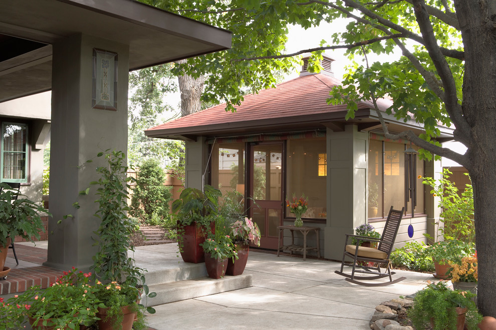 Inspiration for an arts and crafts backyard patio in Minneapolis with concrete slab and a gazebo/cabana.