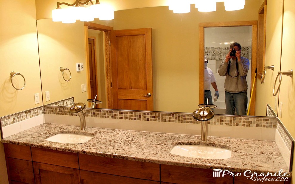 Example of a trendy multicolored tile bathroom design in Seattle with an undermount sink and granite countertops