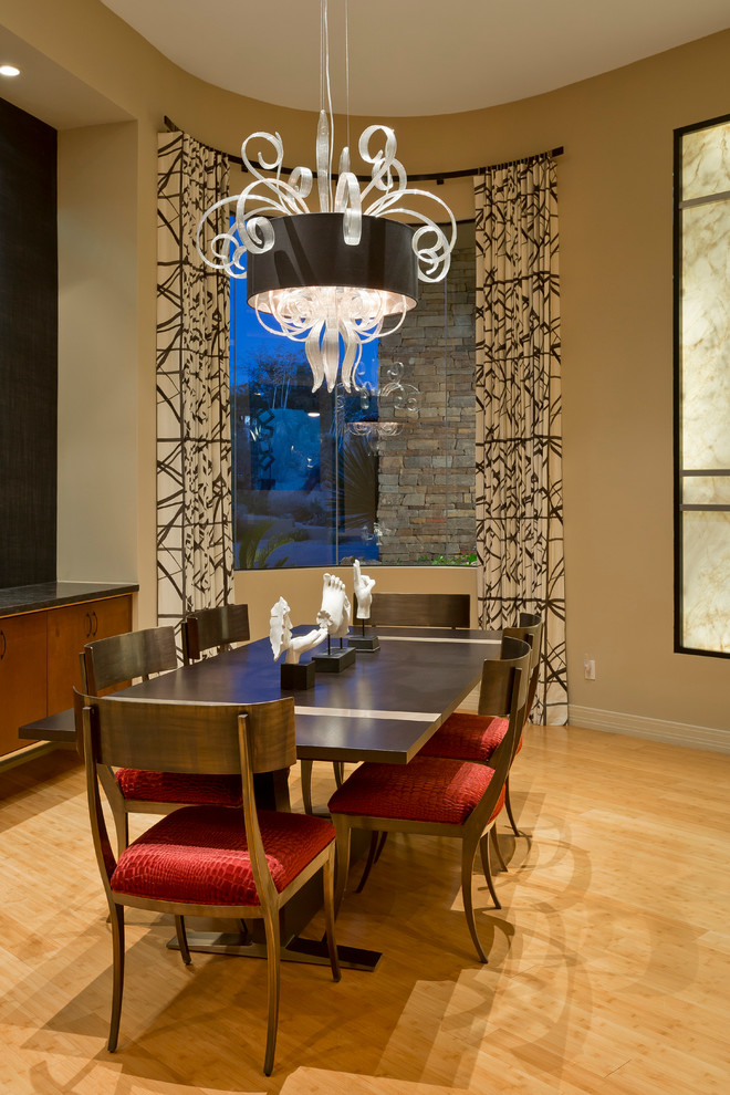 Design ideas for an expansive contemporary open plan dining in Phoenix with beige walls, bamboo floors and no fireplace.