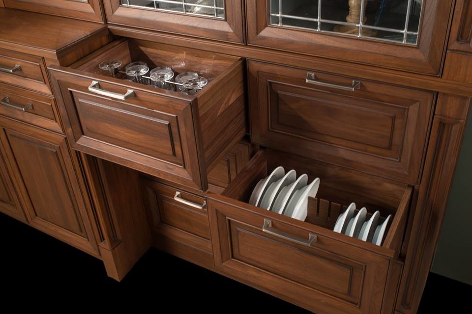 Large traditional galley eat-in kitchen in Other with wood benchtops, raised-panel cabinets and dark wood cabinets.