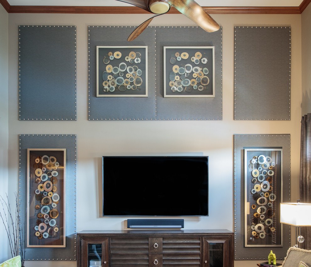 This is an example of a transitional family room in Other with carpet and a wall-mounted tv.