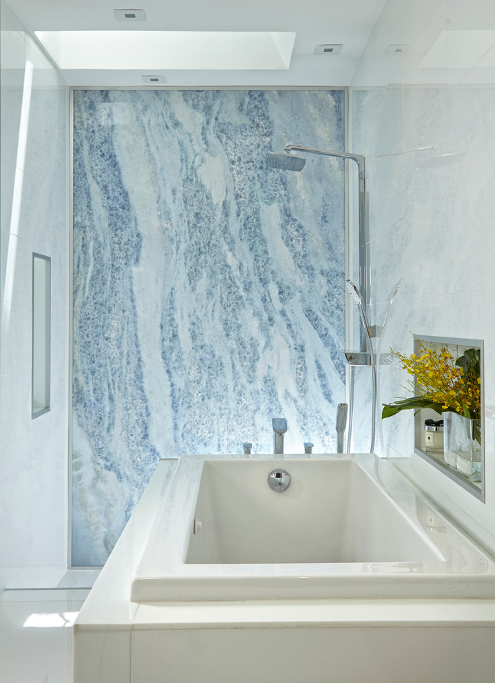 Design ideas for a large contemporary master bathroom in Miami with open cabinets, white cabinets, a japanese tub, an open shower, a one-piece toilet, multi-coloured tile, stone slab, multi-coloured walls, marble floors, a drop-in sink and onyx benchtops.