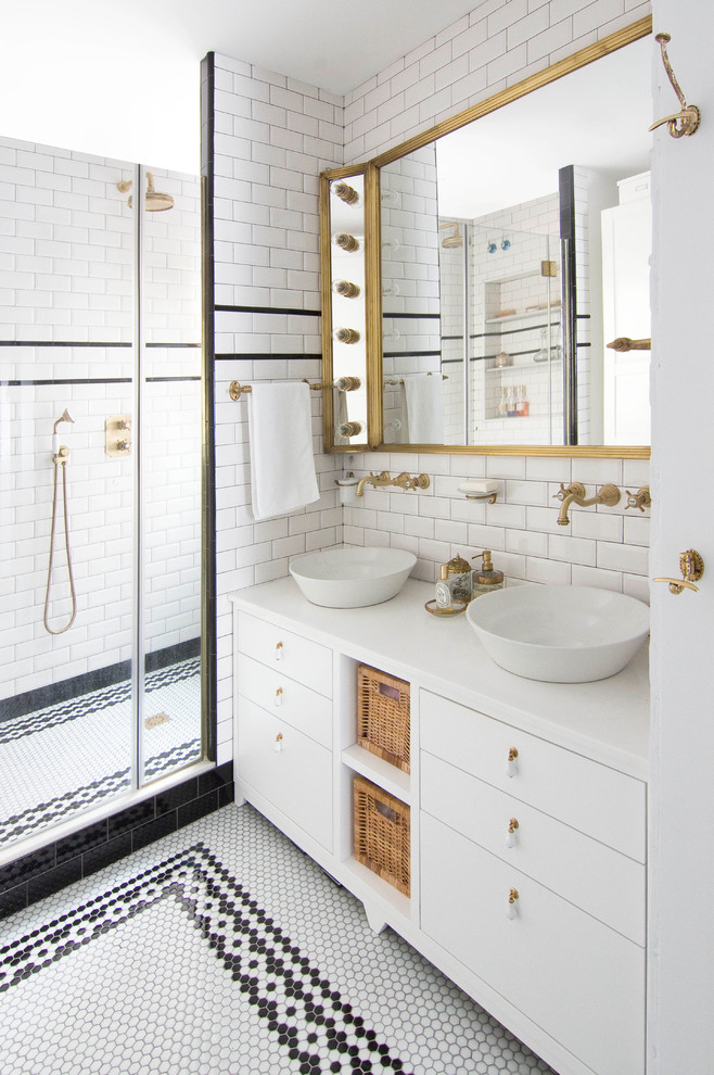 This is an example of a transitional bathroom in Barcelona with black and white tile, white tile, white walls, mosaic tile floors, white floor and white benchtops.