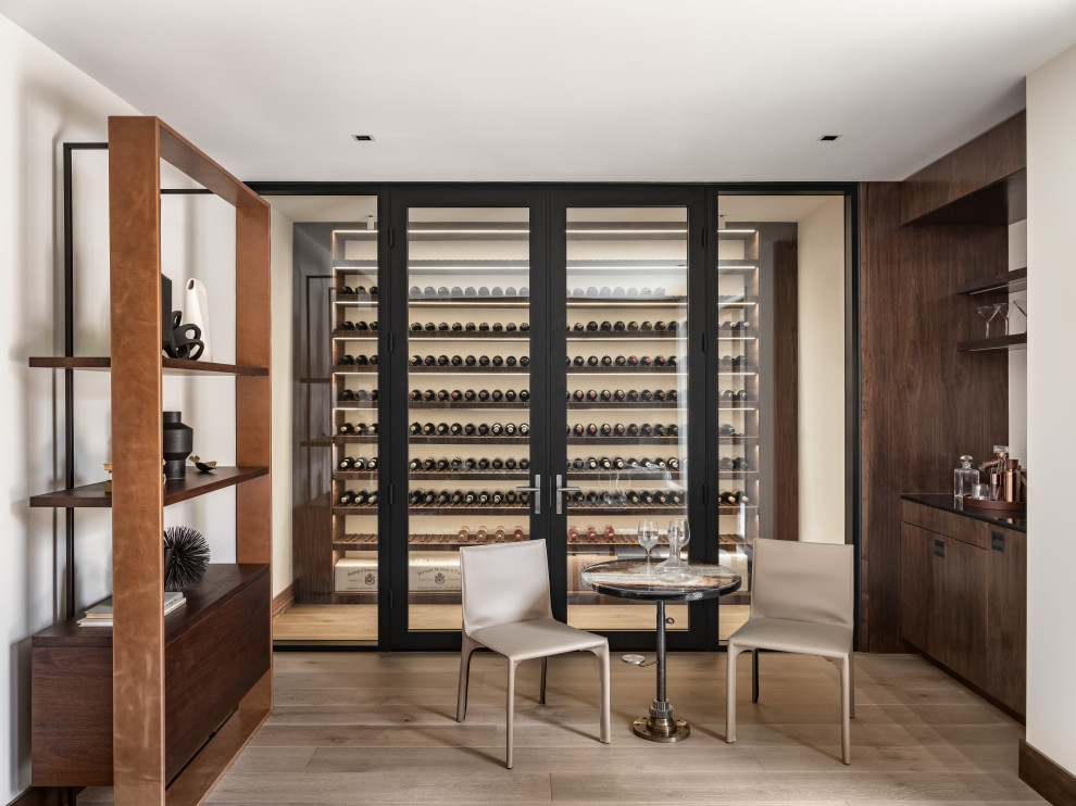 Design ideas for a contemporary wine cellar in San Francisco with light hardwood floors and beige floor.