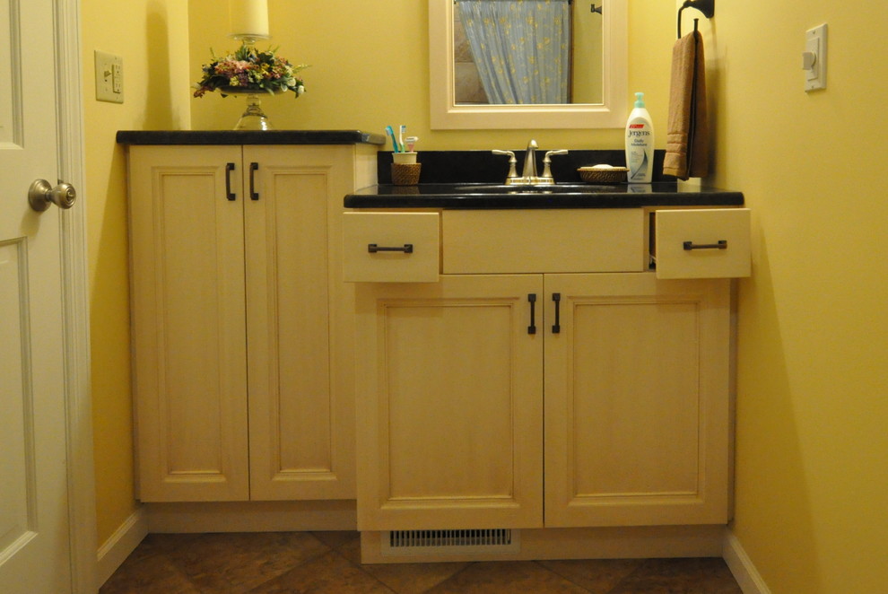 Example of a transitional porcelain tile alcove bathtub design in Chicago with an undermount sink and flat-panel cabinets