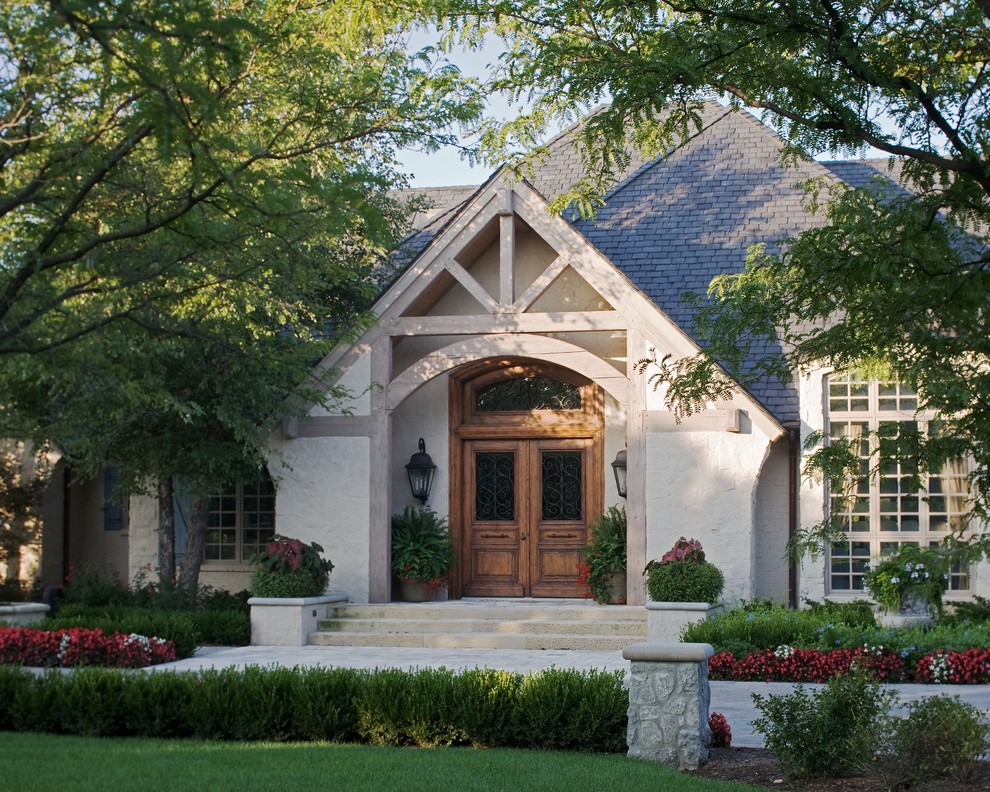 This is an example of a mediterranean beige exterior in Wichita.