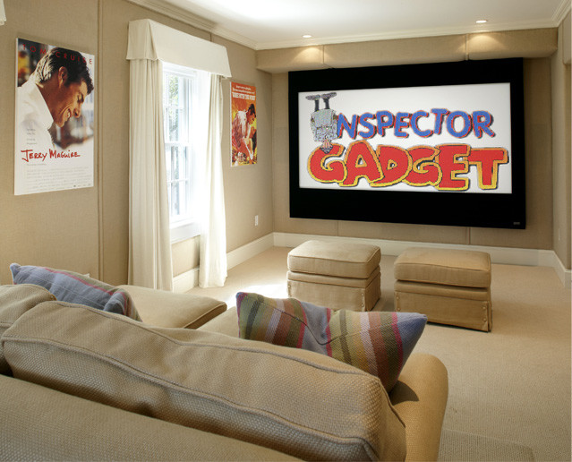 This is an example of a mid-sized beach style enclosed home theatre in Boston with beige walls, carpet and a projector screen.