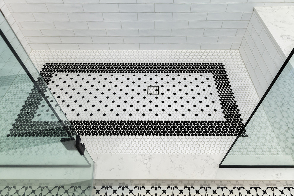 Large transitional master white tile and glass sheet porcelain tile and multicolored floor home design photo in Phoenix with shaker cabinets, white cabinets, a two-piece toilet, white walls, an undermount sink, quartz countertops, a hinged shower door and white countertops