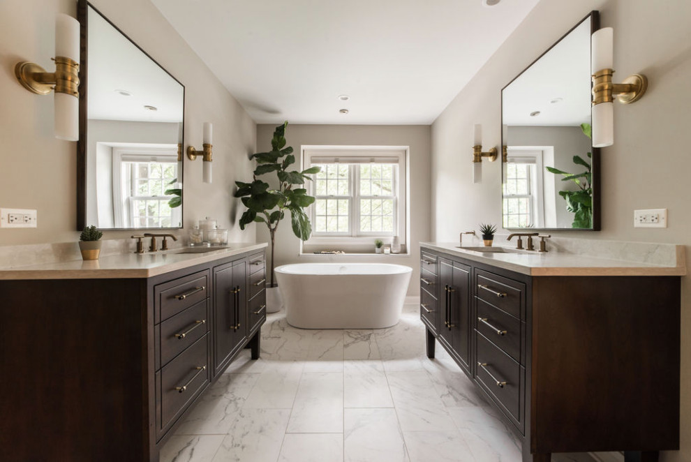 Inspiration for a large transitional master bathroom in Chicago with flat-panel cabinets, dark wood cabinets, a freestanding tub, an alcove shower, white tile, porcelain tile, grey walls, ceramic floors, a drop-in sink, quartzite benchtops, white floor, a hinged shower door and multi-coloured benchtops.