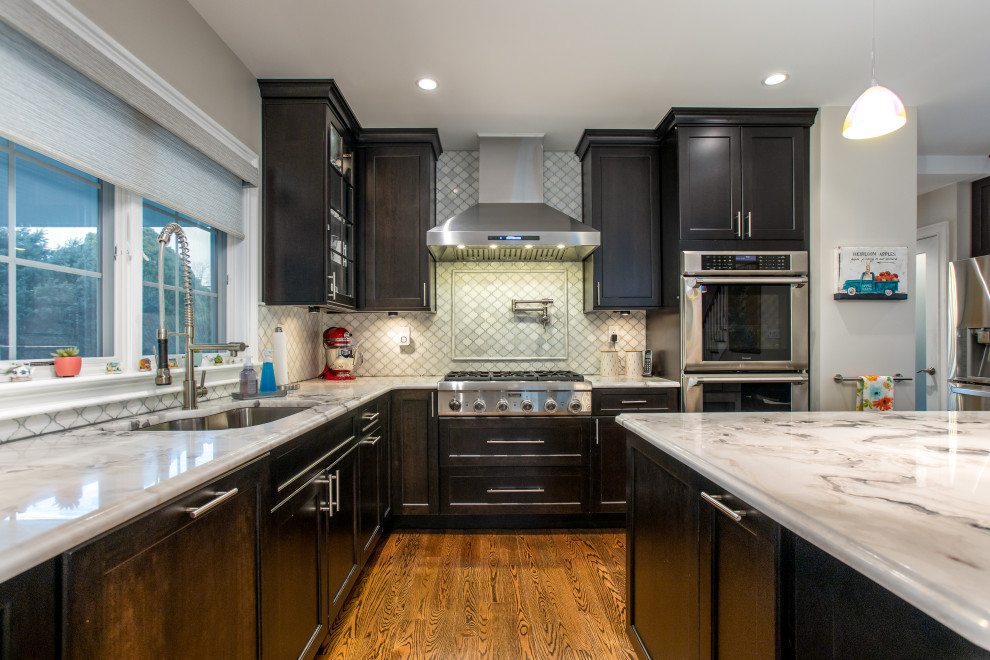 Example of a transitional kitchen design in New York