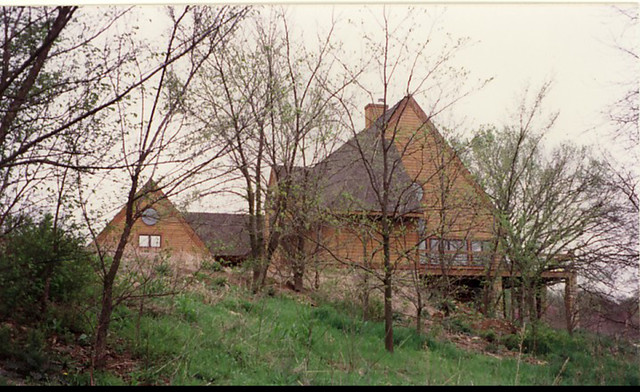 Right exterior. Home office cantilevers to view of lake contemporary-house-exterior