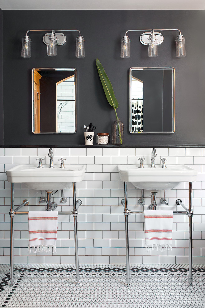 This is an example of a traditional master bathroom in Philadelphia with mosaic tile floors, a console sink, white tile, subway tile, black walls and multi-coloured floor.