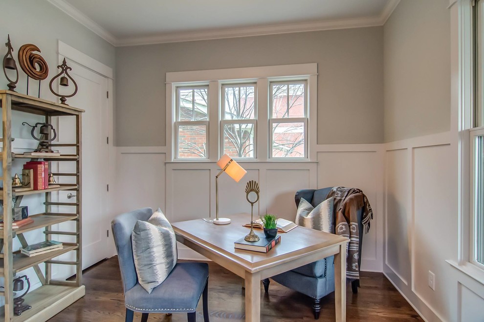Study room - transitional freestanding desk medium tone wood floor study room idea in Nashville
