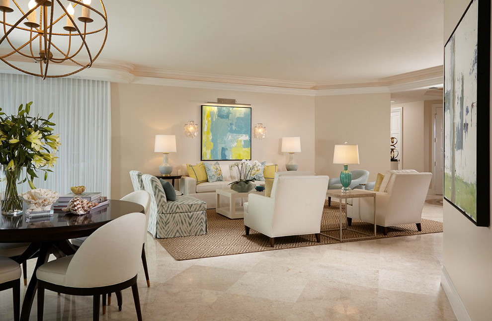 Design ideas for a mid-sized beach style open concept living room in Miami with beige walls and porcelain floors.