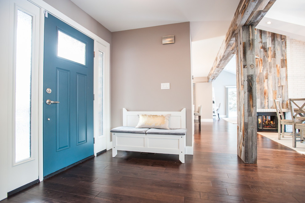 Inspiration for a rustic entryway remodel in Edmonton