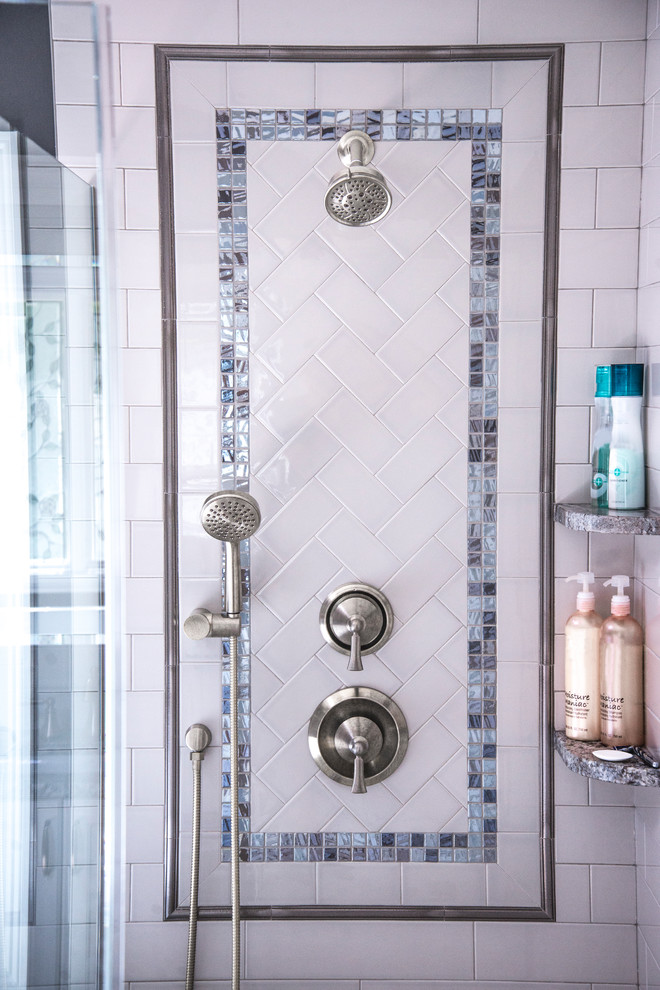 Inspiration for a mid-sized transitional master gray tile and subway tile porcelain tile freestanding bathtub remodel in Chicago with flat-panel cabinets, white cabinets, a two-piece toilet, gray walls, an undermount sink and granite countertops