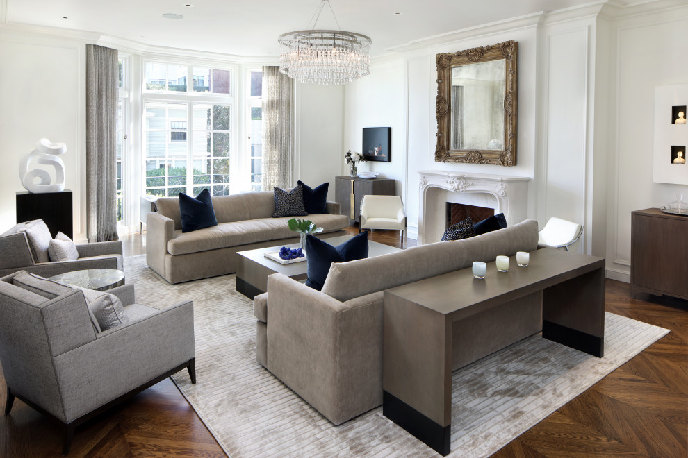 This is an example of a large transitional formal enclosed living room in San Francisco with medium hardwood floors, a standard fireplace and a plaster fireplace surround.