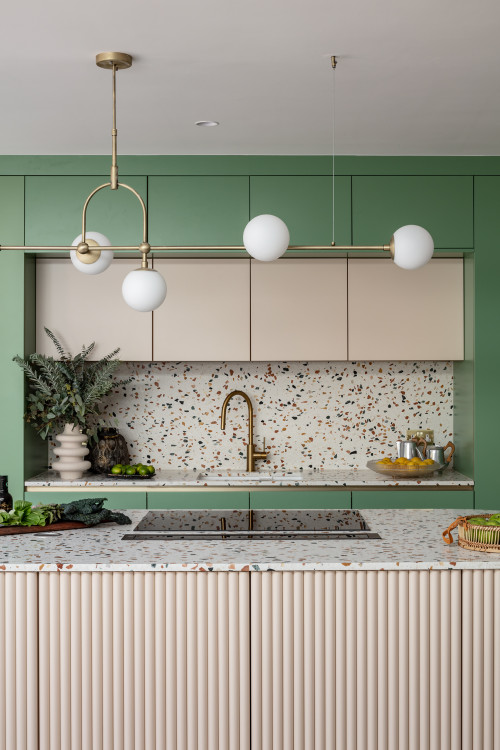Charming Color Collision: Pink and Green Cabinets with Terrazzo Twists