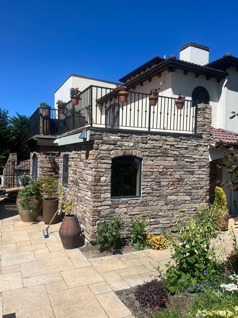 Magnolia Villa--Kitchen Addition + Rooftop Deck