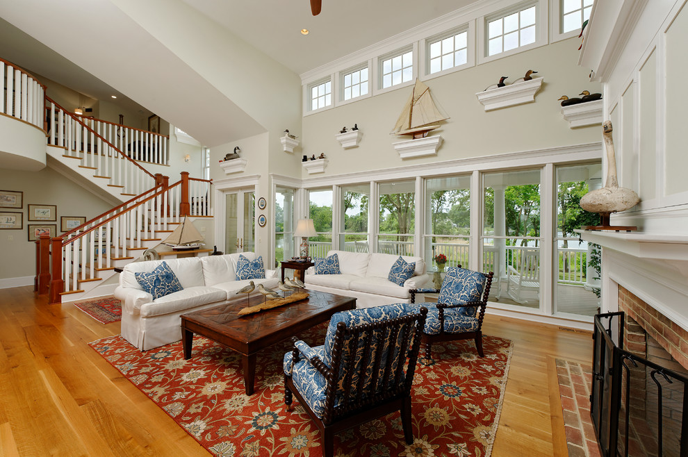 This is an example of a beach style family room in DC Metro.