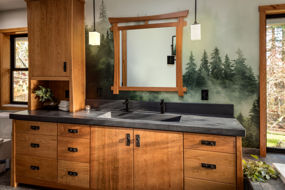 Inspiration for a medium sized world-inspired ensuite bathroom in Other with flat-panel cabinets, medium wood cabinets, an integrated sink, concrete worktops, double sinks, a built in vanity unit, wallpapered walls, multi-coloured walls and grey worktops.
