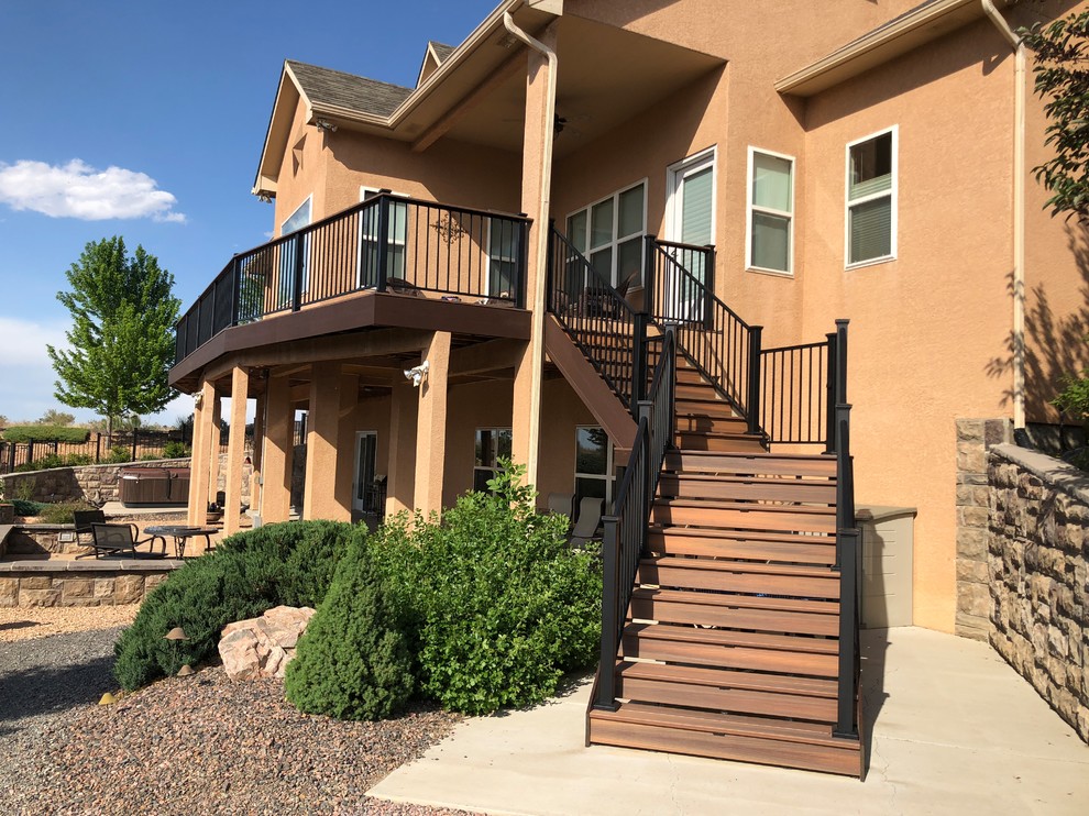 Deck - large transitional backyard deck idea in Denver