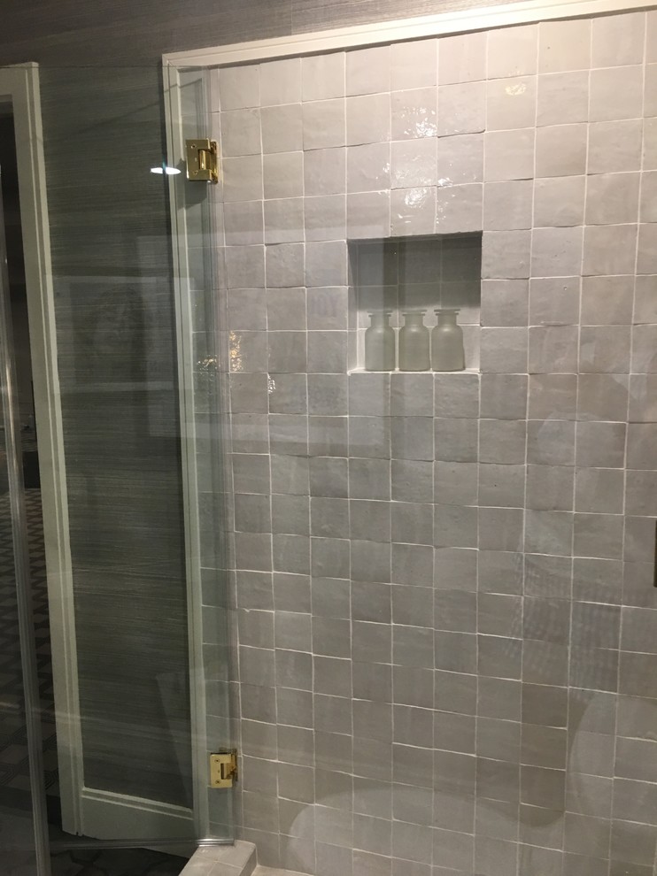 Design ideas for a small contemporary bathroom in DC Metro with a corner shower, white tile, terra-cotta tile, white walls, terra-cotta floors, white floor and a hinged shower door.