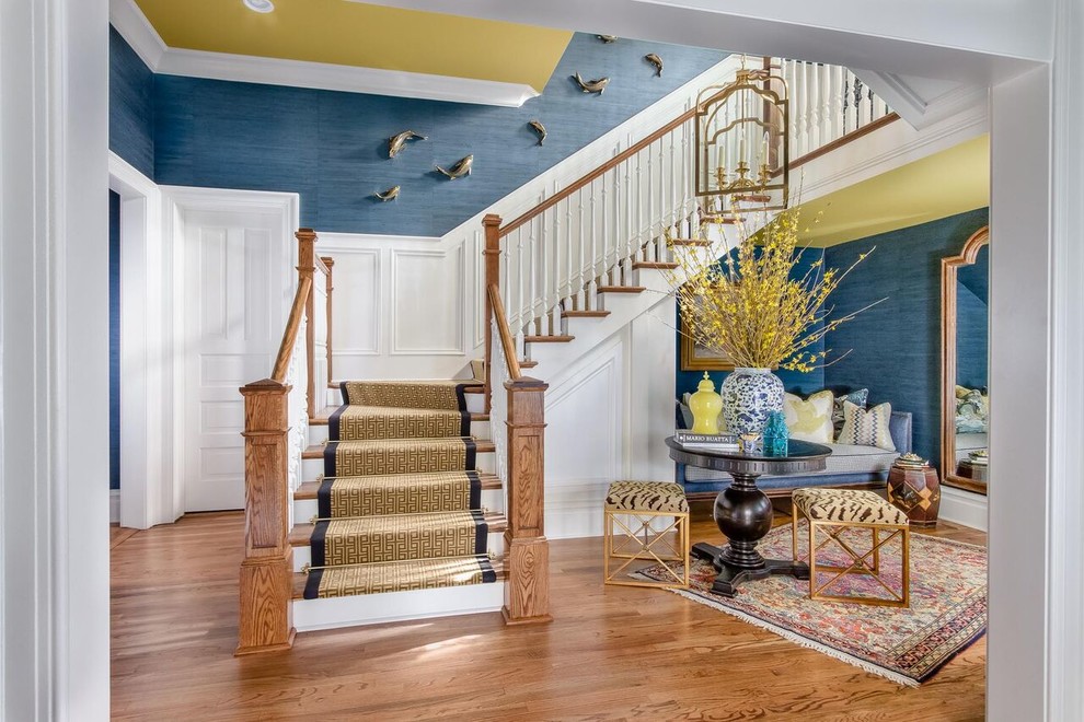 Photo of a beach style carpeted u-shaped staircase in Nashville with carpet risers.