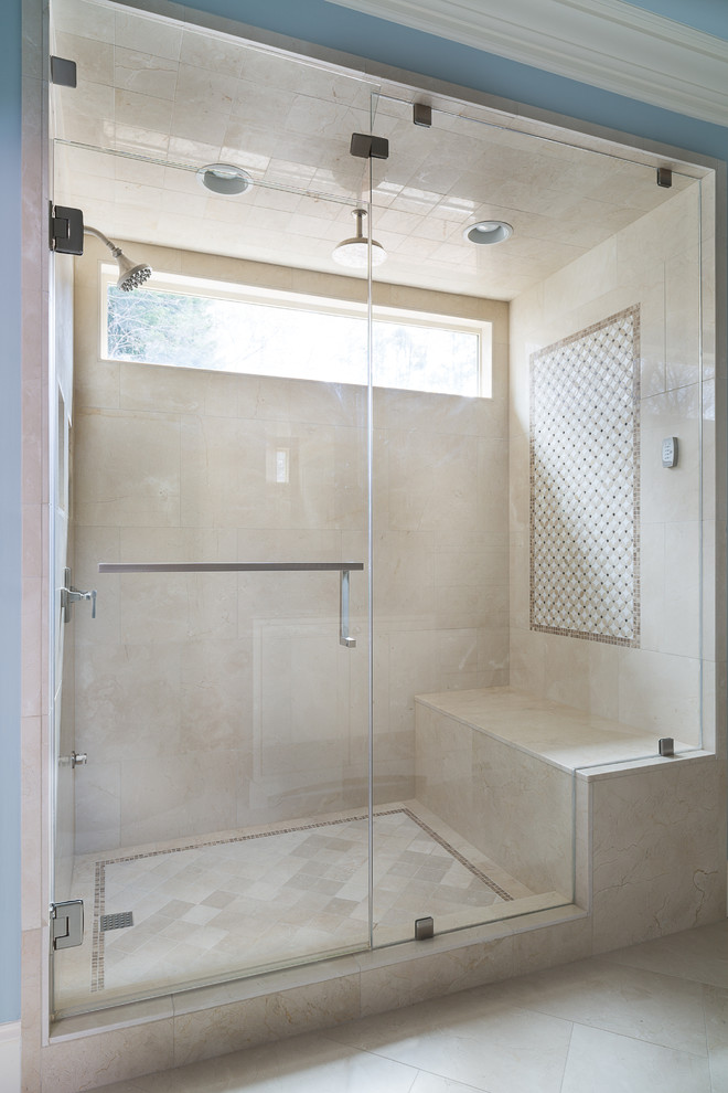 Design ideas for a mid-sized traditional master bathroom in Atlanta with an undermount sink, flat-panel cabinets, white cabinets, marble benchtops, a two-piece toilet, beige tile, stone tile, blue walls, marble floors and an alcove shower.
