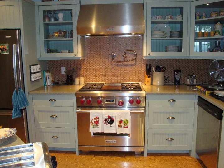 Photo of a traditional kitchen in Toronto with cork floors.
