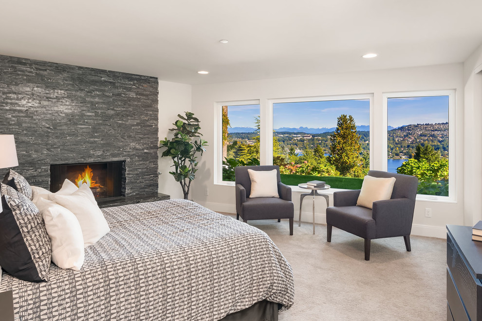 Example of a transitional bedroom design in Seattle