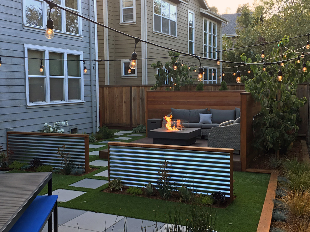 Small contemporary backyard deck in San Francisco with a fire feature.
