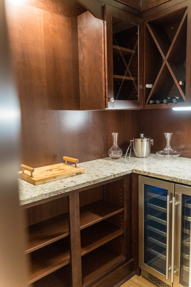 Example of a transitional home design design in Raleigh