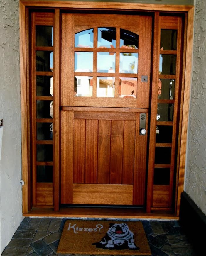 Design ideas for a mid-sized traditional front door in Orange County with a dutch front door and a medium wood front door.