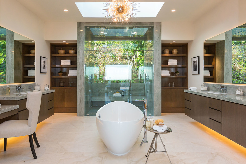 Design ideas for a large contemporary master bathroom in Los Angeles with an undermount sink, flat-panel cabinets, dark wood cabinets, a freestanding tub, a double shower, white walls, gray tile, stone slab, porcelain floors, marble benchtops and grey benchtops.