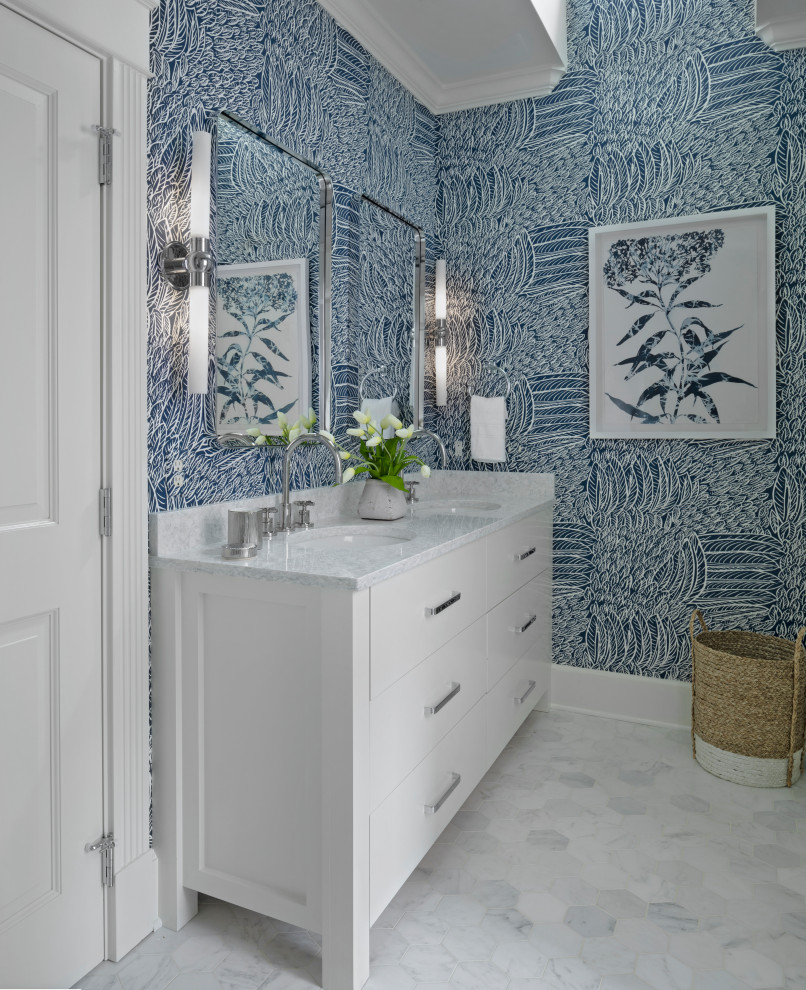 Mid-sized beach style bathroom in Other with shaker cabinets, white cabinets, a freestanding tub, a curbless shower, a two-piece toilet, gray tile, marble, white walls, mosaic tile floors, an undermount sink, engineered quartz benchtops, grey floor, a hinged shower door and grey benchtops.