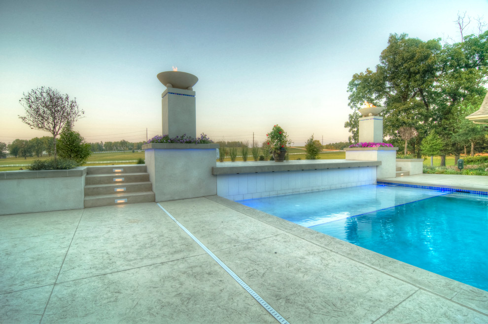 Hot tub - large transitional backyard concrete paver and rectangular natural hot tub idea in Cedar Rapids