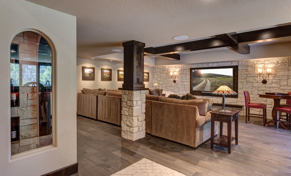 Mid-sized transitional look-out basement in Denver with beige walls, vinyl floors, no fireplace and brown floor.