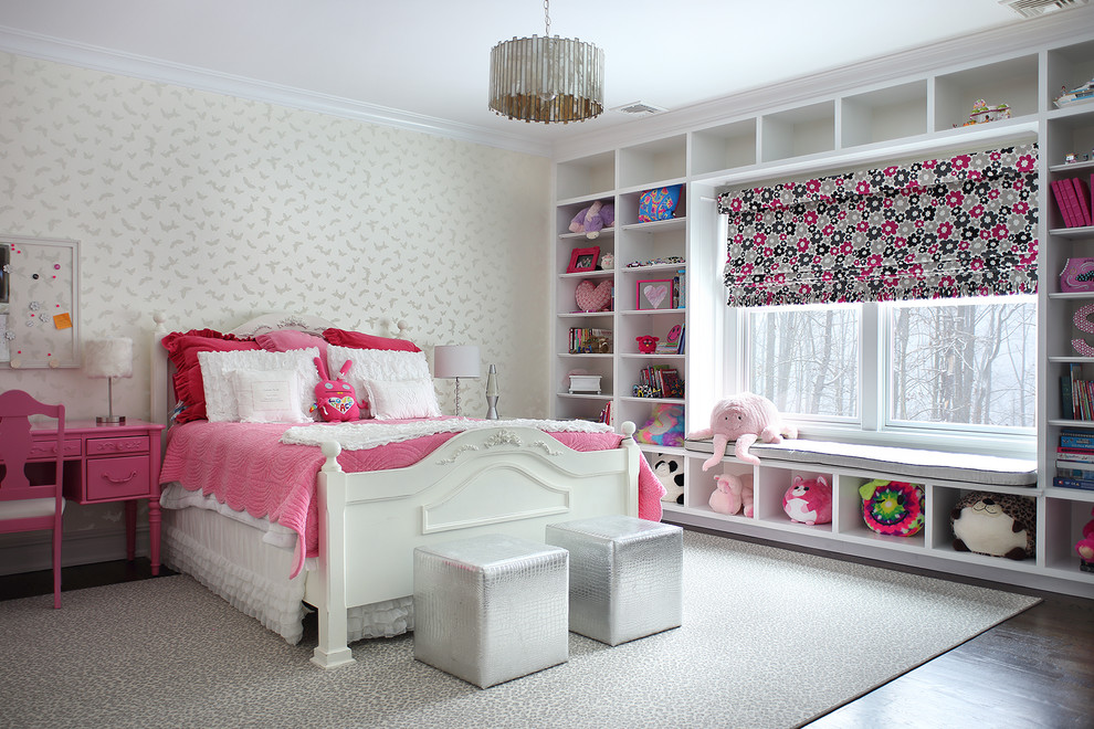 Transitional kids' bedroom in New York with dark hardwood floors and beige walls for kids 4-10 years old and girls.