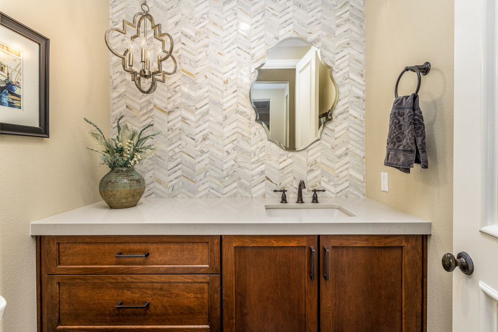 Inspiration for a mid-sized beach style 3/4 bathroom in San Diego with shaker cabinets, dark wood cabinets, white tile, mosaic tile, beige walls, an undermount sink, engineered quartz benchtops, white benchtops, a single vanity and a built-in vanity.