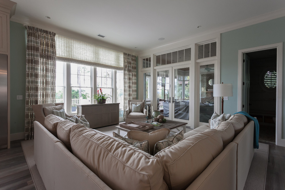 This is an example of a beach style living room in Charleston.