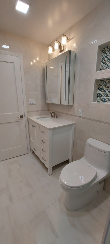 Photo of a medium sized modern bathroom in New York with freestanding cabinets, white cabinets, quartz worktops, a single sink and a freestanding vanity unit.