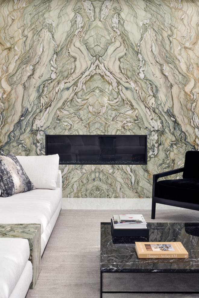 サンフランシスコにあるラグジュアリーな広いコンテンポラリースタイルのおしゃれなLDK (白い壁、セラミックタイルの床、横長型暖炉、石材の暖炉まわり、白い床) の写真