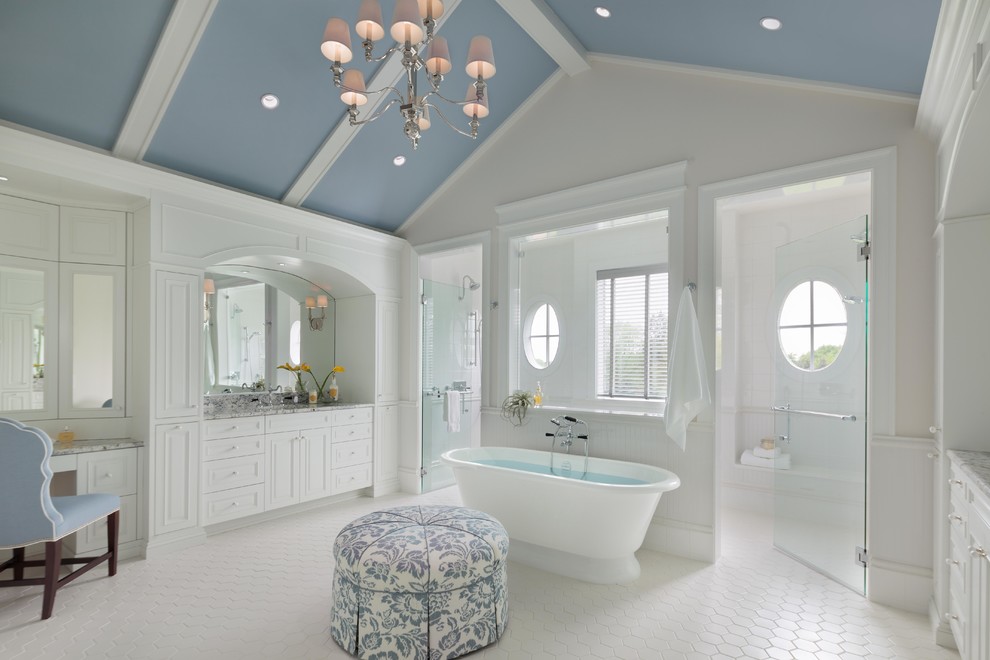 Design ideas for a traditional master bathroom in Chicago with recessed-panel cabinets, white cabinets, a freestanding tub, a curbless shower, white tile, white walls and a hinged shower door.