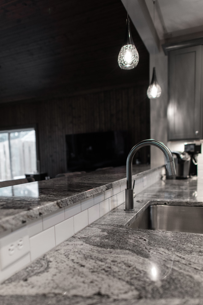 Kitchen remodel with granite and subway tile backsplash
