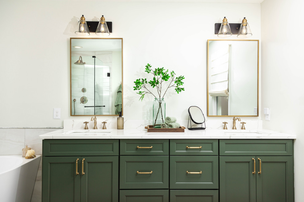Mid-sized contemporary master bathroom in Atlanta with shaker cabinets, green cabinets, a freestanding tub, a two-piece toilet, porcelain tile, porcelain floors, an undermount sink, engineered quartz benchtops, a hinged shower door, a niche, a double vanity and a built-in vanity.
