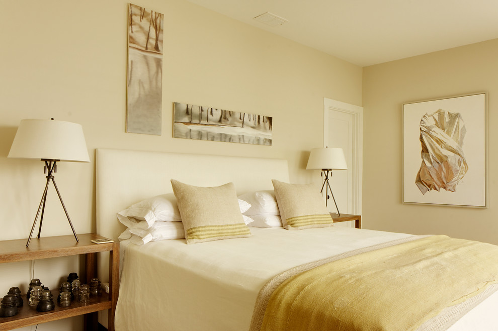 Inspiration for a mid-sized country master bedroom in Chicago with white walls and medium hardwood floors.