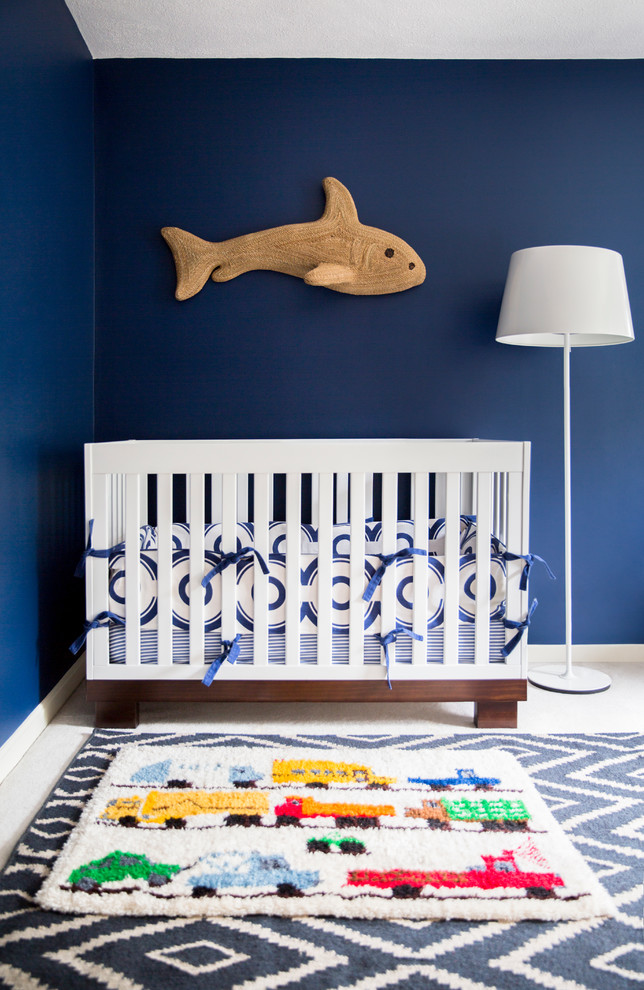 Design ideas for a transitional nursery for boys in Boston with blue walls.