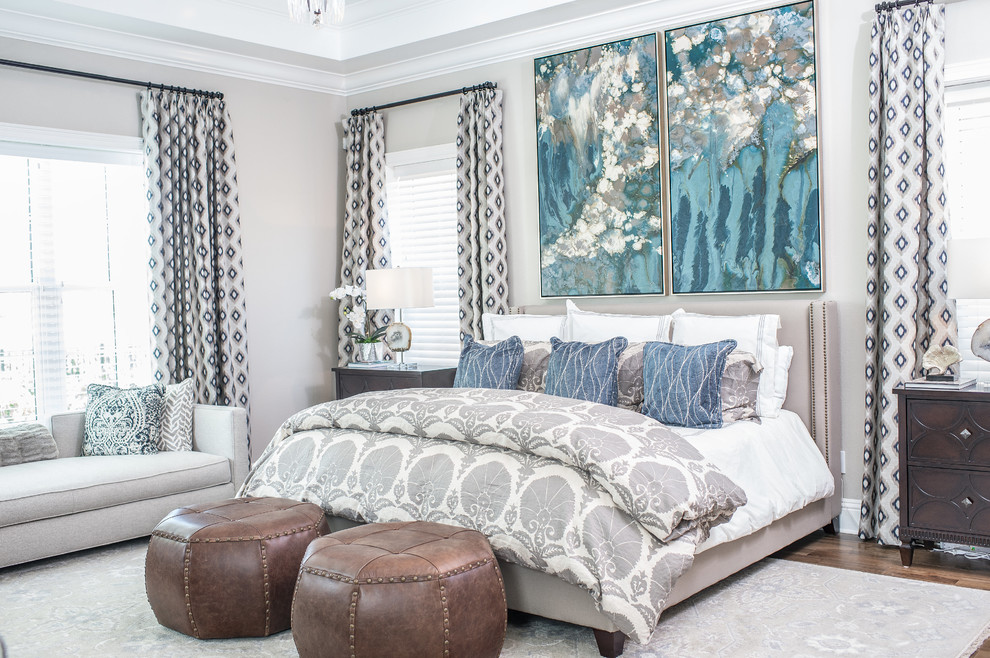 Design ideas for a large transitional master bedroom in Orlando with grey walls, dark hardwood floors and no fireplace.