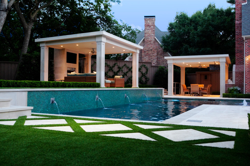 Transitional backyard garden in Dallas with a water feature and natural stone pavers.